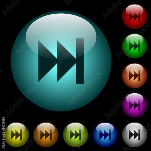 Media fast forward icons in color illuminated glass buttons