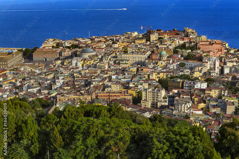 Italy. Cityscape of Naples (historic centre of city is a UNESCO World Heritage Site) seen from Castle Sant'Elmo. There is Piazza del Plebiscito (on the left) and Castel dell'Ovo in the background