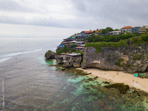 Suluban Uluwatu beach (Pantai Suluban) and Blue point aerial view from drone, Bali, Indonesia photo