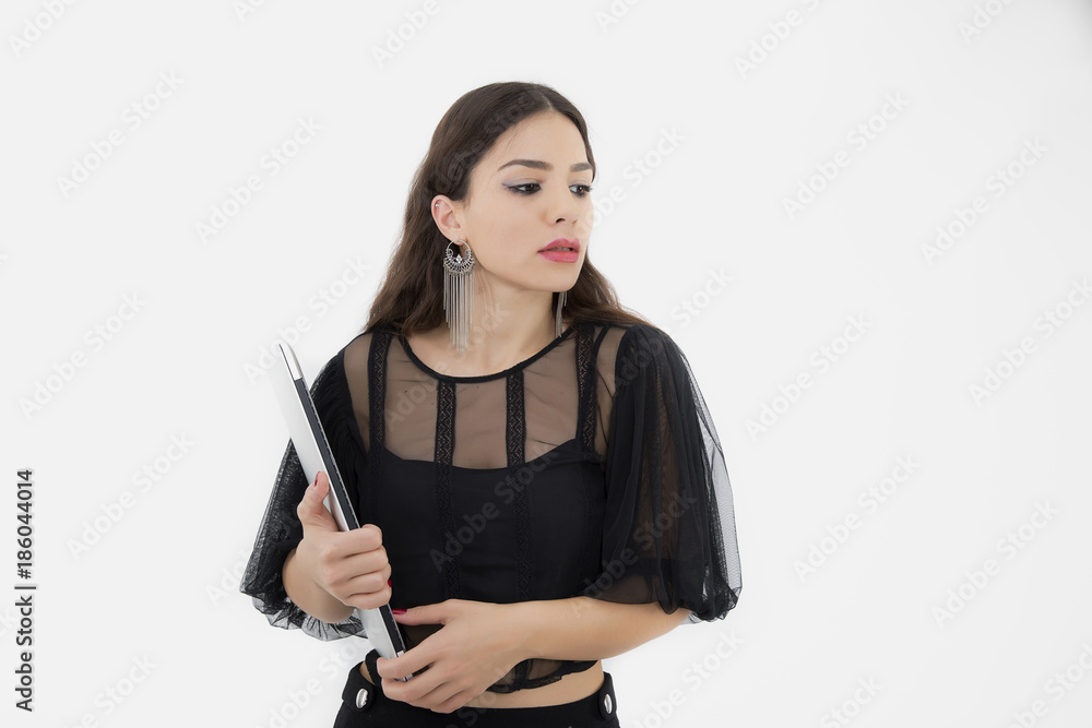 The beautiful lady is using a laptop computer