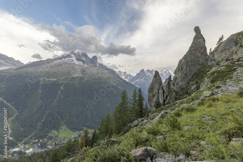 Aiguille du Dru and Aiguille Verte seen from Aiguillette D'Argentiere on the way to Lacs De Cheserys, Haute Savoie, French Alps, France photo