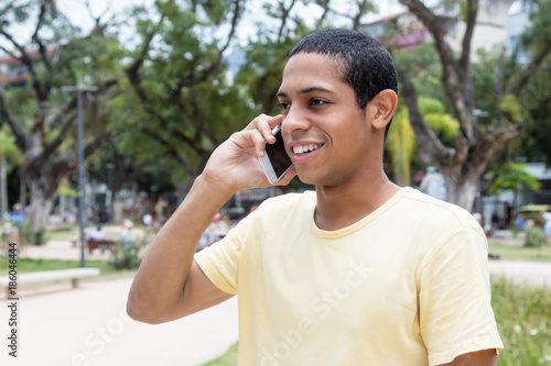 Egyptian young adult man at phone