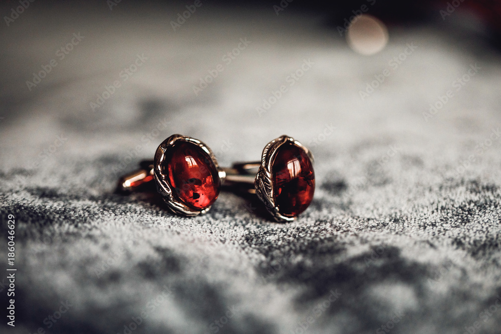 Men's accessories - bcufflinks on textile background. Men's accessories - bcufflinks on textile background.