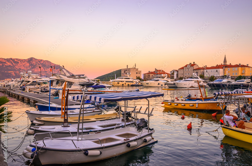 View of old town in Budva and port at sunset, Montenegro