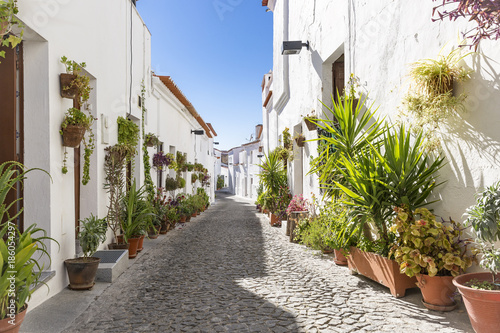 Mouraria de Moura, a street in Moura city with typical white houses, District of Beja, Portugal photo