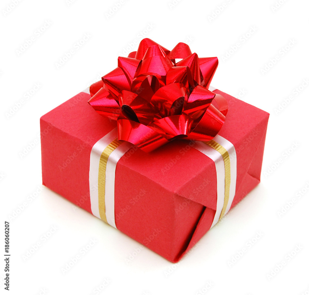 Red gift box with ribbon and bow isolated on the white background Red gift box with ribbon and bow isolated on the white background