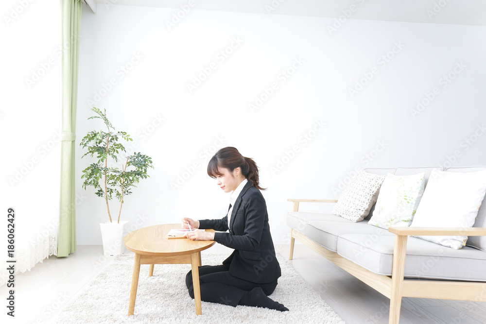 Businesswoman working at home