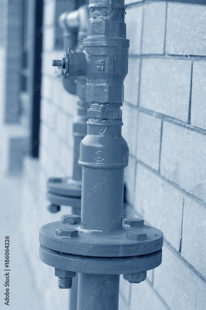 Fototapeta premium Pipe and yellow valve