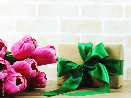 Fototapeta Naklejka Na Ścianę i Meble -  happy new year and gift box with green ribbon
