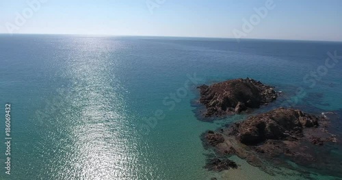 Wallpaper Mural SARDINIA, ITALY  – JULY 2016 : Aerial shot over Chia Beach island on a beautiful day with sea and horizon in view Torontodigital.ca