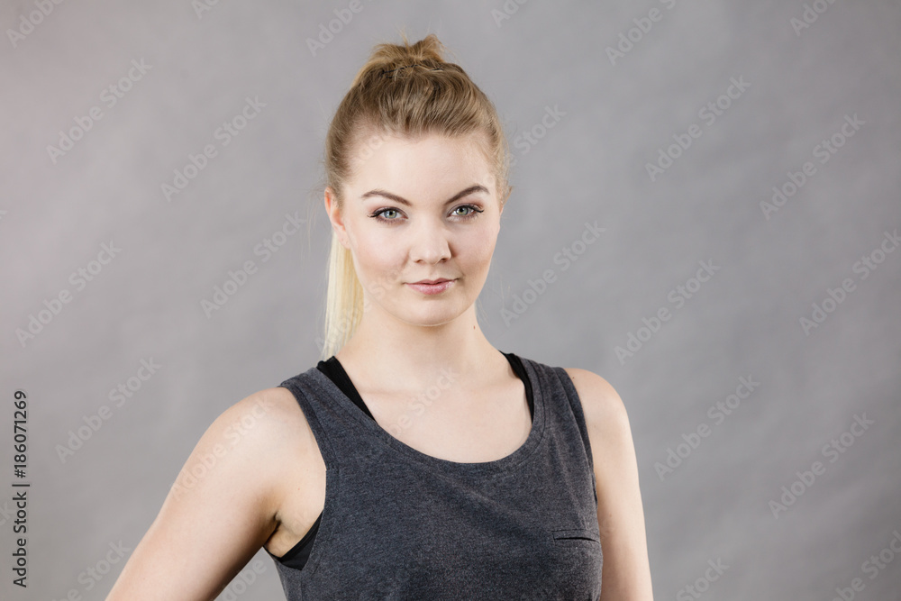 Happy woman wearing black tank top Happy woman wearing black tank top