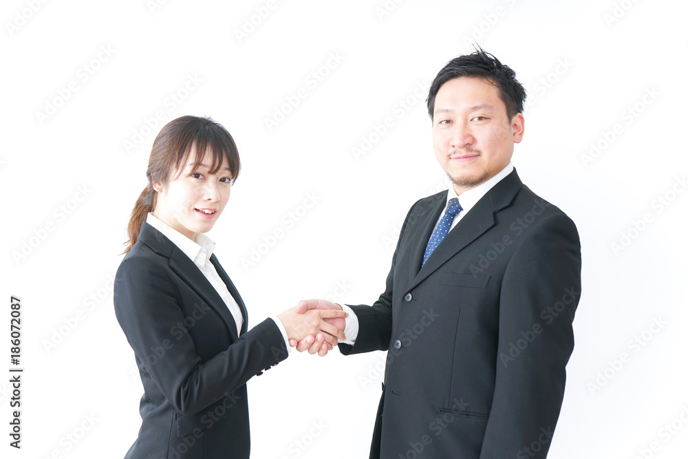 Business persons exchanging business cards Business persons exchanging business cards