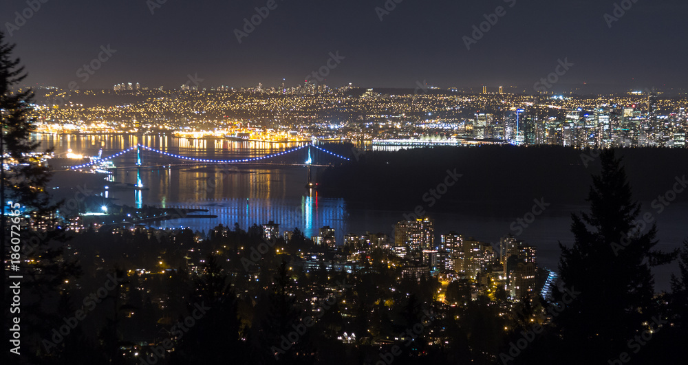 Naklejka premium Night view of Lions Gate Bridge, Vancouver downtown, and Lower Mainland