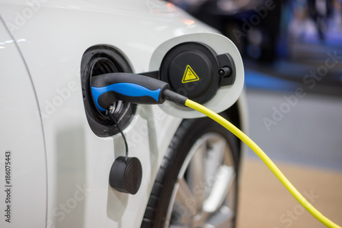 Electric car charger. Power supply electric car charging for electric car technology transportation in the future.
