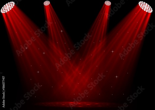 Red spotlights on dark background