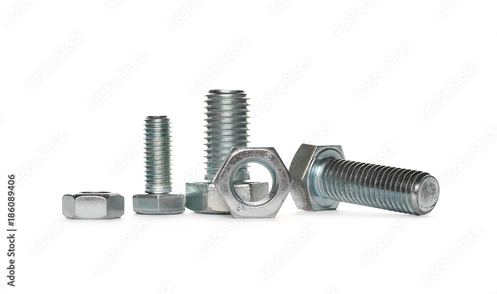 Pile metal screws, bolts and nuts isolated on white background Pile metal screws, bolts and nuts isolated on white background