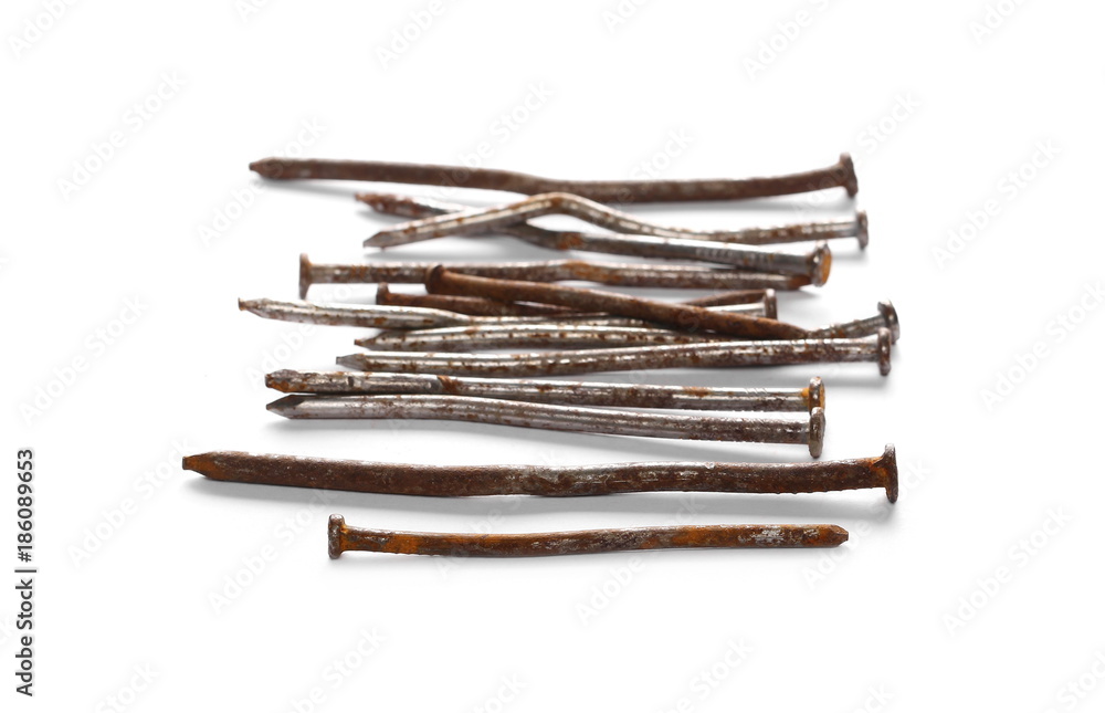 Pile of old, rusty metal nails isolated on white background Pile of old, rusty metal nails isolated on white background