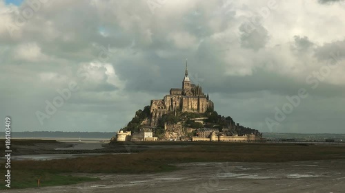 Wallpaper Mural the sunshines between storm clouds on mont st michel in normandy, france Torontodigital.ca