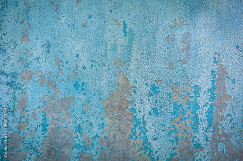the texture of the peeling paint on the sheet iron. old paint texture on metal