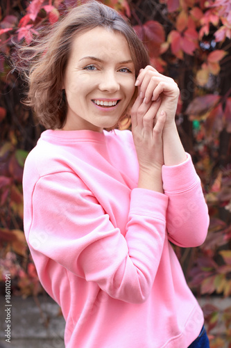 Beautiful smiling woman in ...