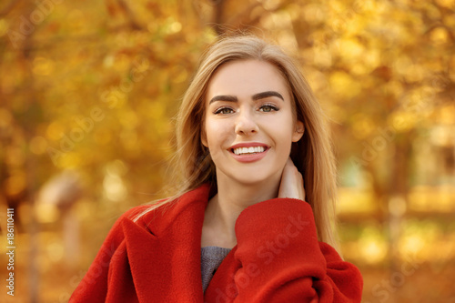 Beautiful smiling woman in ...