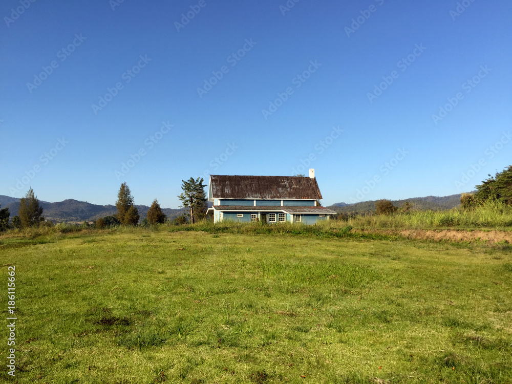 Obraz premium View of a farmhouse in summer