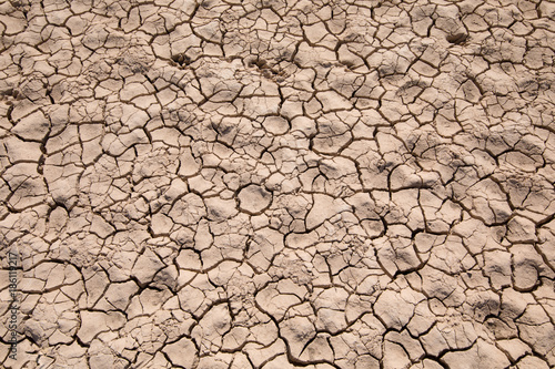 detail of dry earth ground background, drought in Entrepenas reservoir, in Guadalajara, Castilla, Spain Europe 