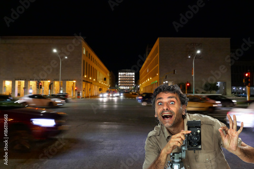 Photography Photographer with vintage camera at the Eur district in Rome, Italy