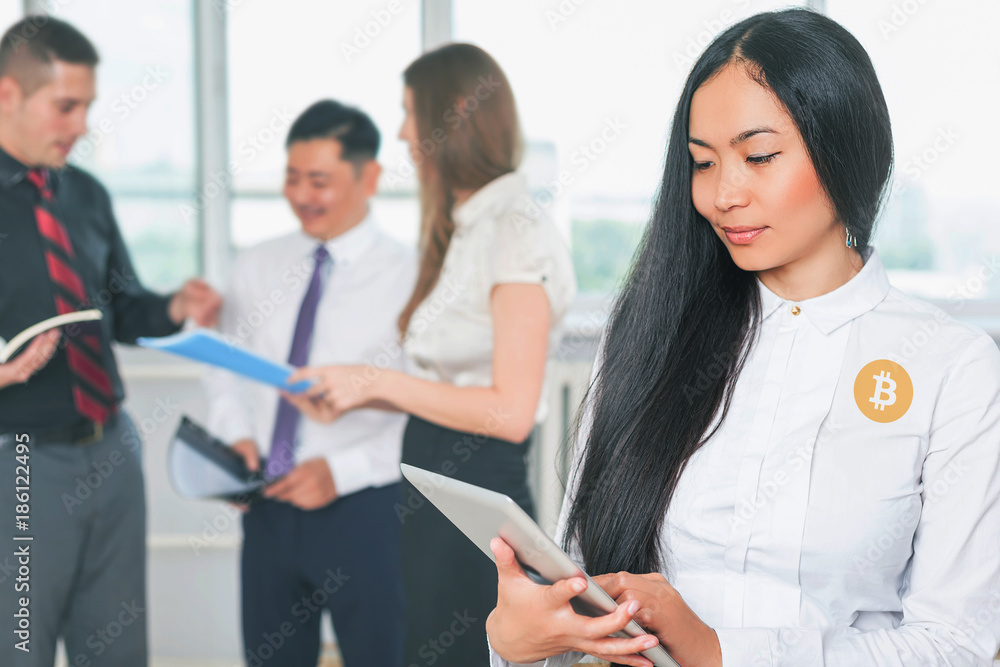 Blockchain technology. Bitcoin cryptocurrency. Asian business people Blockchain technology. Bitcoin cryptocurrency. Asian business people