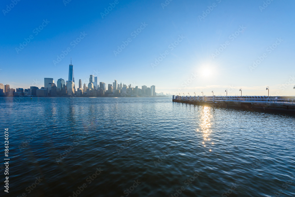 Scenic view to New York, Manhattan over Hudson river from Liberty State Park in wintertime. New Jersey, USA.