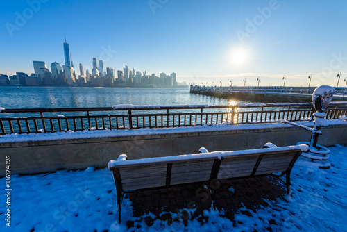 Scenic view to New York, Manhattan over Hudson river from Liberty State Park in wintertime. New Jersey, USA. photo