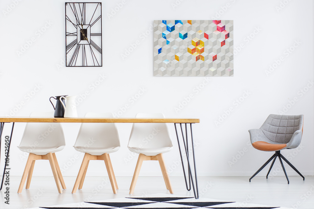 Fototapeta premium White chairs at wooden table