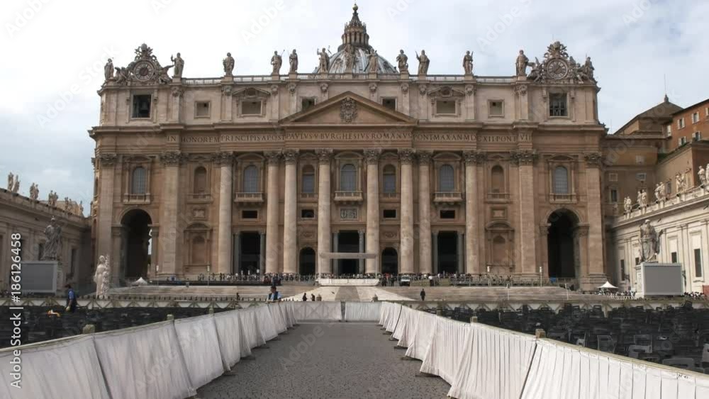 an exterior view of saint peter's basilica and square in rome, italy an exterior view of saint peter's basilica and square in rome, italy