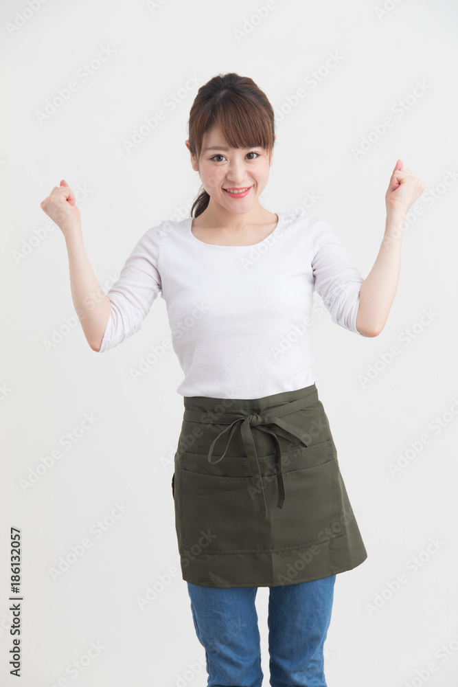 エプロン姿の女性・白バック エプロン姿の女性・白バック