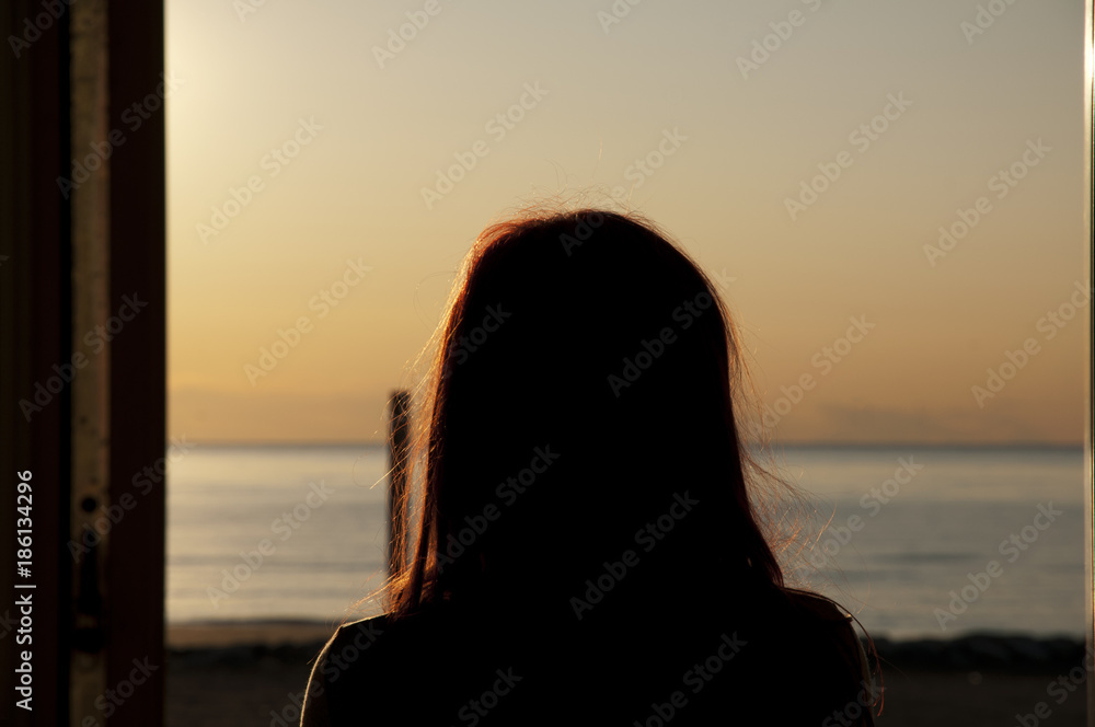 Woman looking beyond the horizon Woman looking beyond the horizon