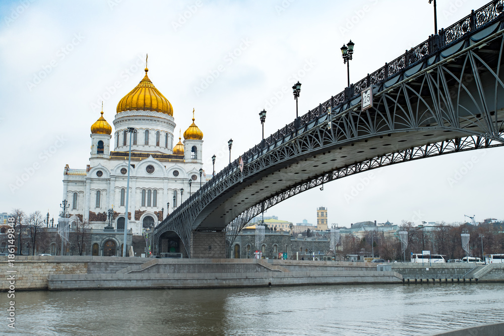 Cathedral Of Christ Savior With Bridge In Winter Day. Famous Christian Landmark In Russia. Moscow, Russia.