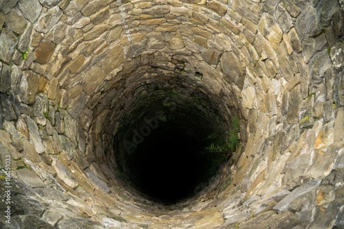 Deep water well in the town, inside. Slovakia