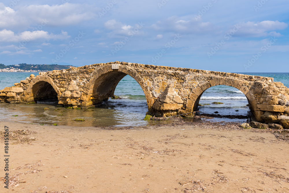 Fototapeta premium The Venetian Bridge of Argassi in Zakynthos. The bridge is a sightseeing location that many tourists visit. Zakynthos island in Greece, Ionian Sea.