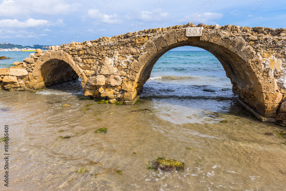 Fototapeta premium The Venetian Bridge of Argassi in Zakynthos. The bridge is a sightseeing location that many tourists visit. Zakynthos island in Greece, Ionian Sea.