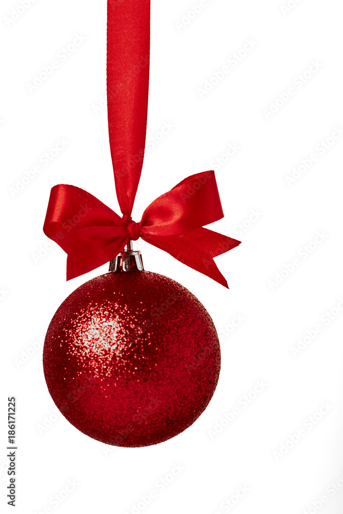 Red christmas ball with red bow over white Red christmas ball with red bow over white