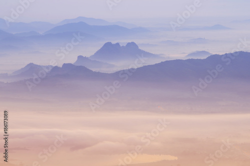 Sea of mist and Sunrise Background. © areeya_ann