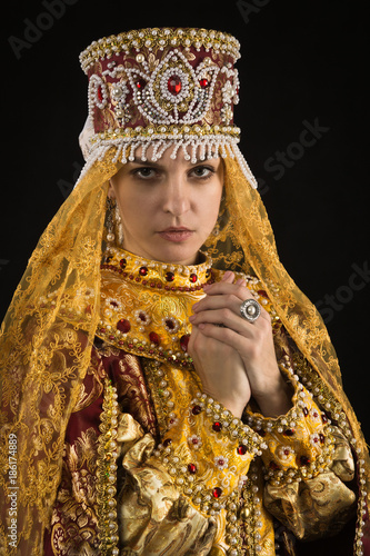 Russian queen in historical dress suit