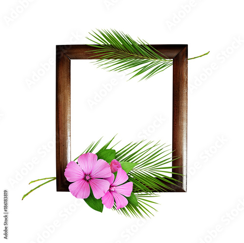Palm leaves and pink wild f...