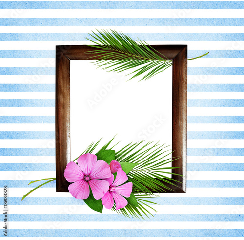 Palm leaves and pink wild f...