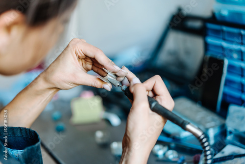 The girl is engaged in jewelry business