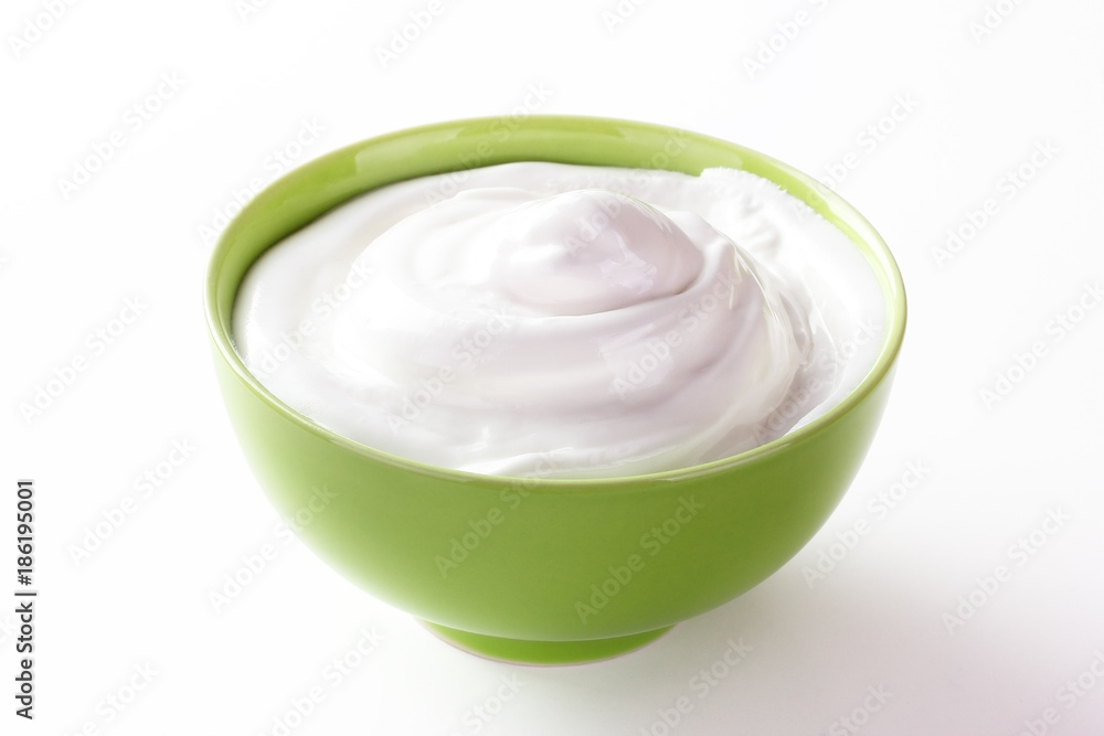 cream sour in a plate isolated white backround cream sour in a plate isolated white backround