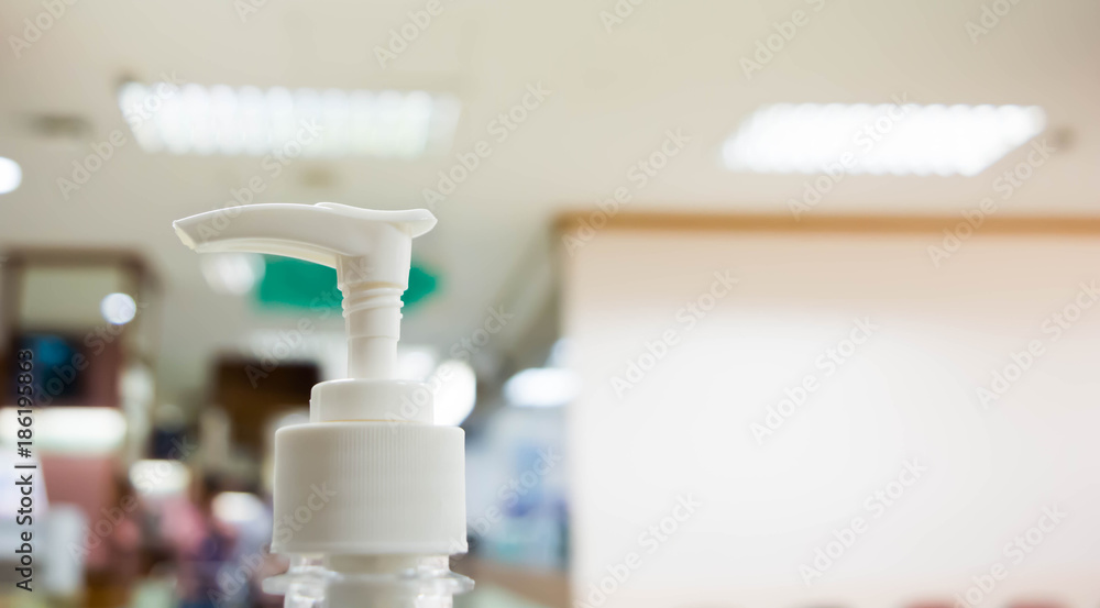 A plastic pump bottle of alcohol gel srcub. A plastic pump bottle of alcohol gel srcub.