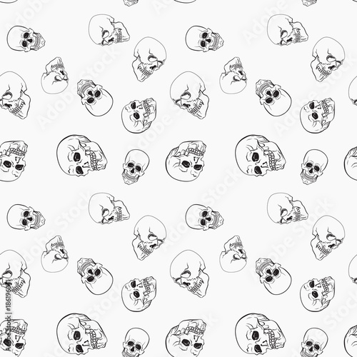 Dark skulls on white background vector pattern