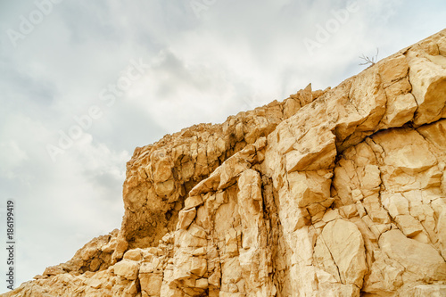 View on rock in dry desert in Israel. Sand, rocks and stones in hot middle east tourism place