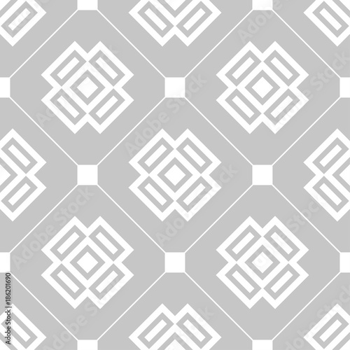 Gray and white geometric ornament. Seamless pattern